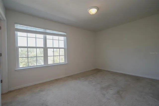an empty room with a window