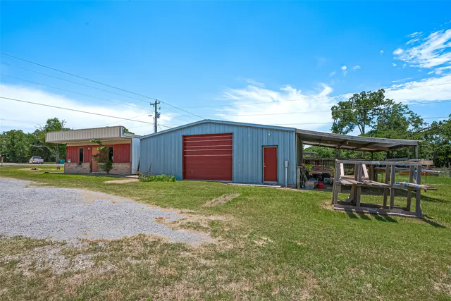 an aerial view of a house with a garden