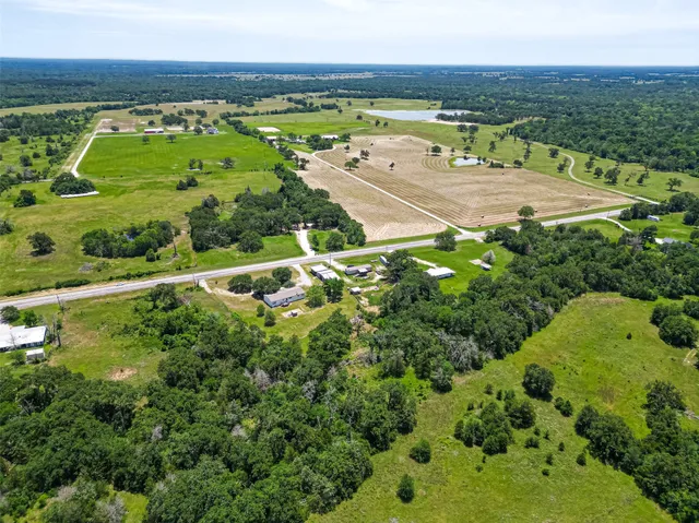 a view of a yard with an outdoor space