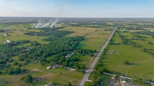 a view of a garden from a balcony