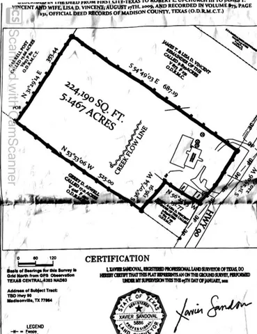 an aerial view of residential houses with outdoor space and street view