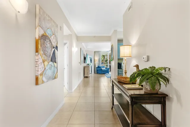 a hallway with a stove a washer and dryer