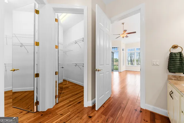 a view of a lake with beach and mountain view
