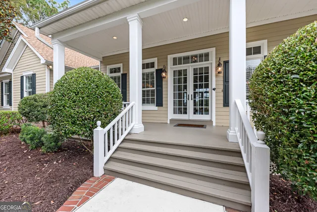 a kitchen with granite countertop a stove a sink and a granite counter tops