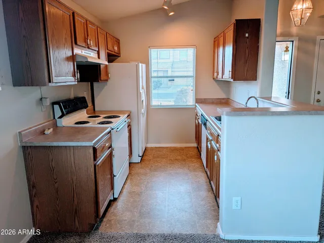a utility room with washer and dryer