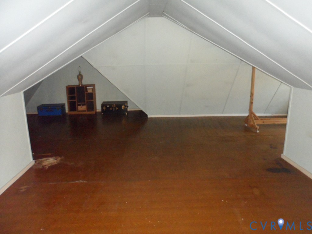 1716 Maple Shade Lane Richmond, VA 23227 - Photo 13 of 14 a view of a big room with wooden floor