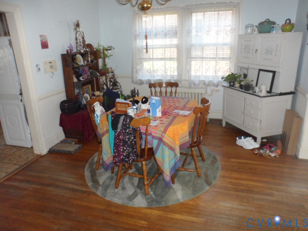 1716 Maple Shade Lane Richmond, VA 23227 - Photo 7 of 14 a view of a dining room with furniture window and wooden floor