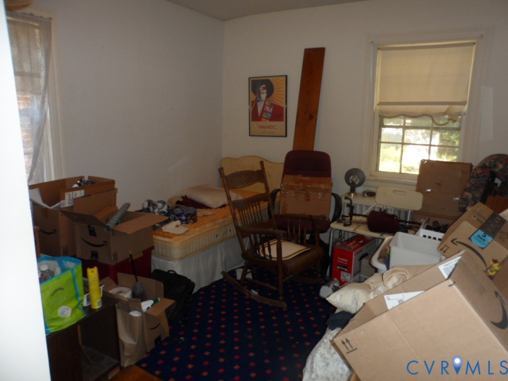 1716 Maple Shade Lane Richmond, VA 23227 - Photo 10 of 14 a living room with furniture and a window