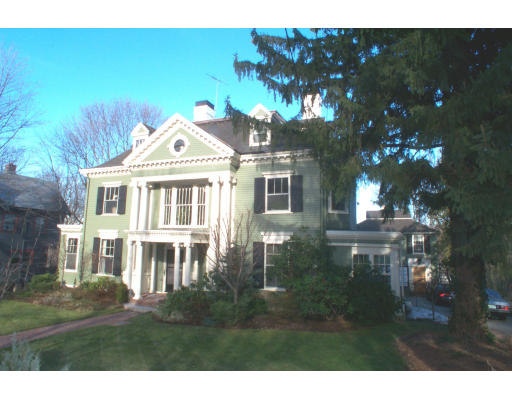 185 Buckminster Road Brookline, MA 02445 - Photo 1 of 5 a front view of a house with a garden