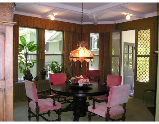 185 Buckminster Road Brookline, MA 02445 - Photo 2 of 5 a dining room with furniture and a large window