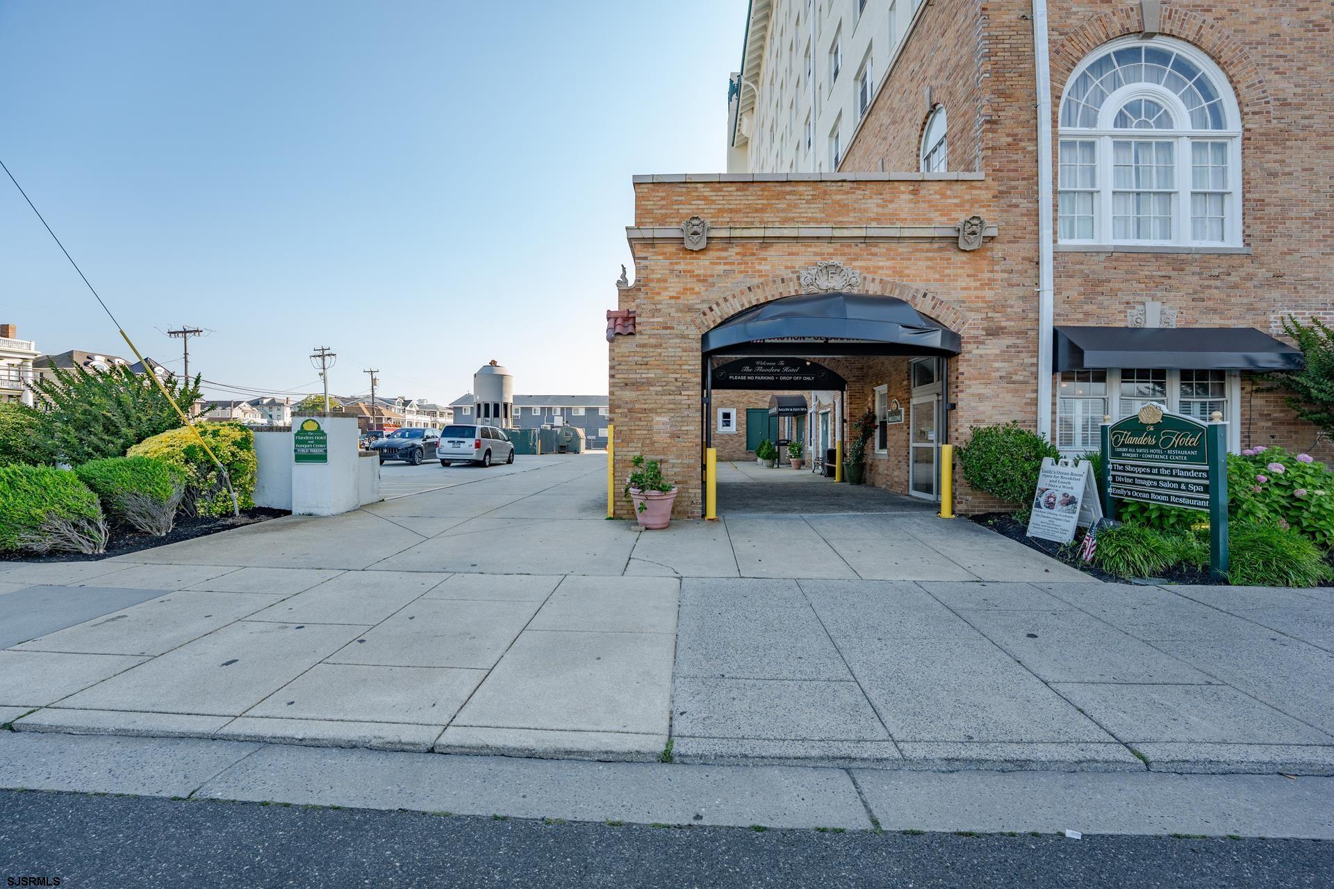 719 East 11th Street, Unit 510 Ocean City, NJ 08226 - Photo 6 of 16 a front view of a house with garden