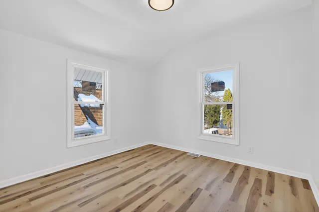 an empty room with windows