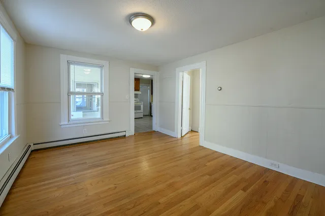 an empty room with windows