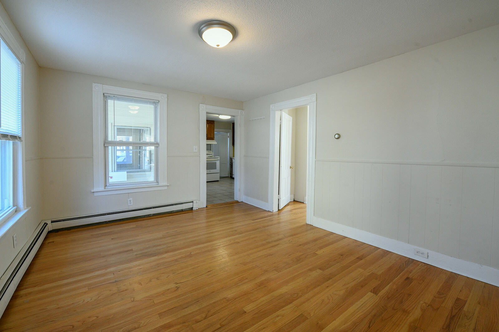 63 New Britain Avenue, Unit 1 Farmington, CT 06085 - Photo 15 of 25 an empty room with windows
