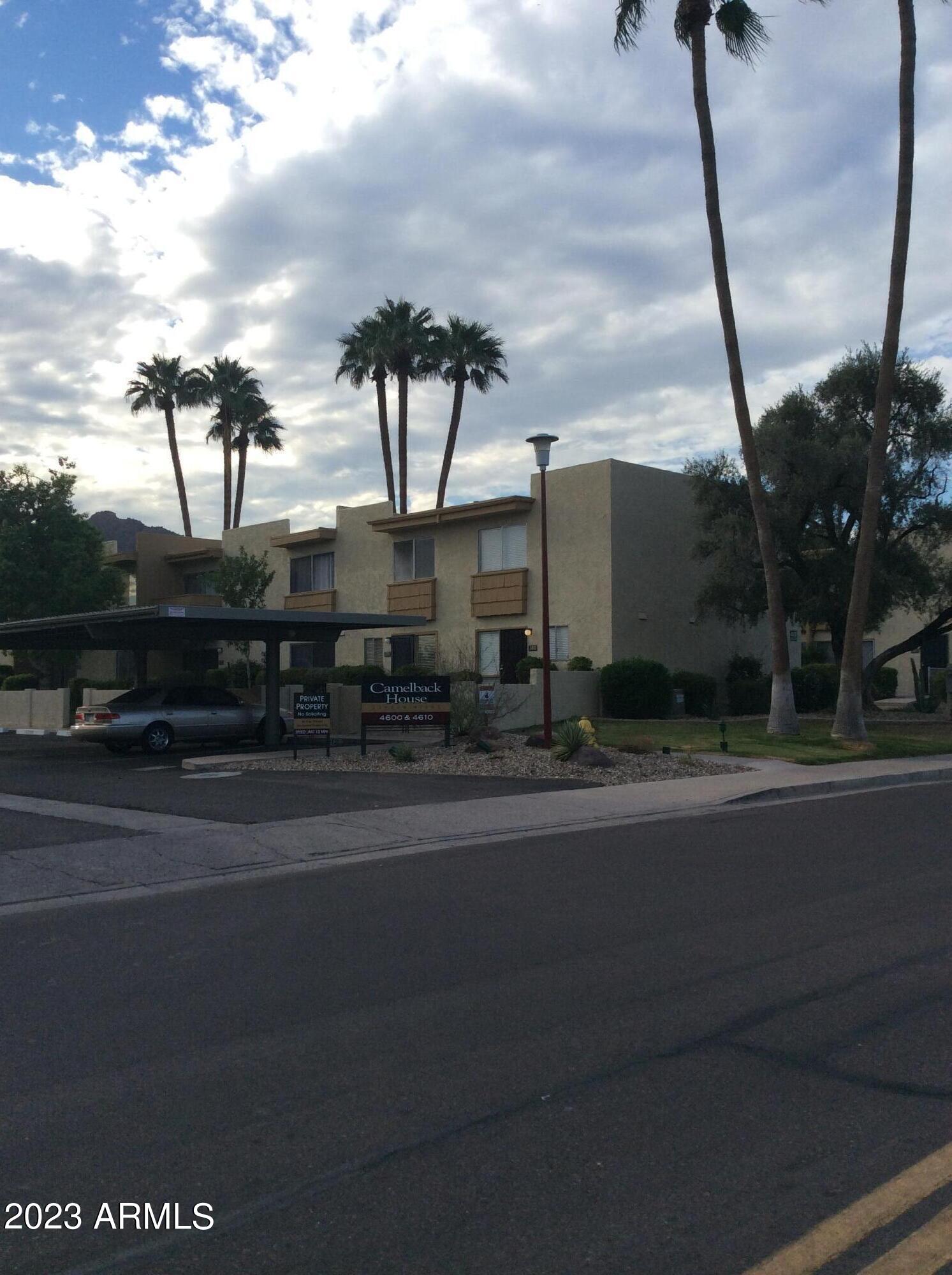 4600 North 68th Street, Unit 356 Scottsdale, AZ 85251 - Photo 15 of 16 a front view of a house with a garden