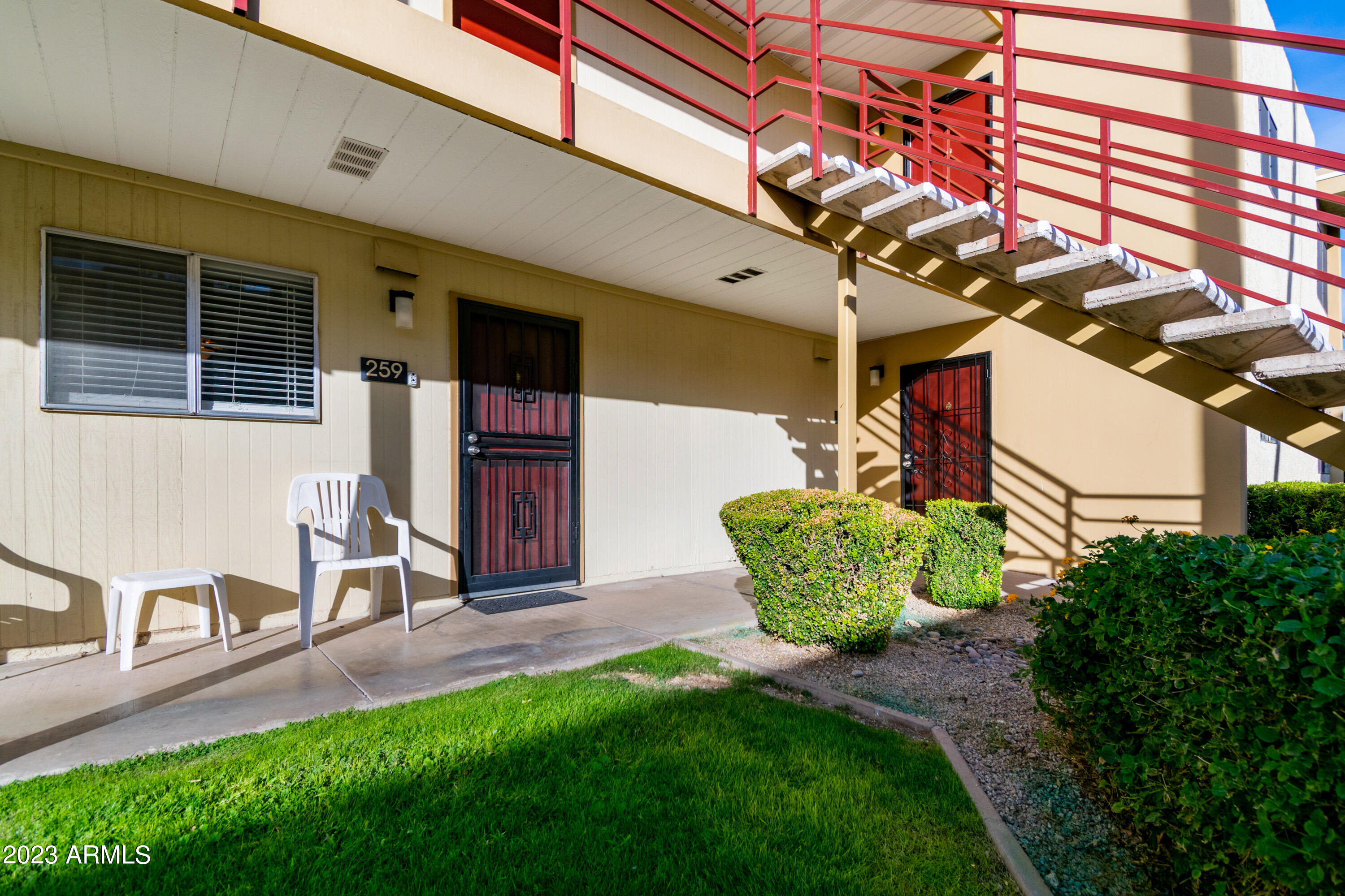 4600 North 68th Street, Unit 356 Scottsdale, AZ 85251 - Photo 16 of 16 a view of a two chairs in the patio
