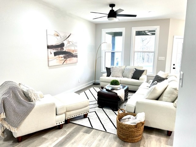 199 Gower Street Pleasant View, TN 37146 - Photo 11 of 38 a living room with furniture and a window