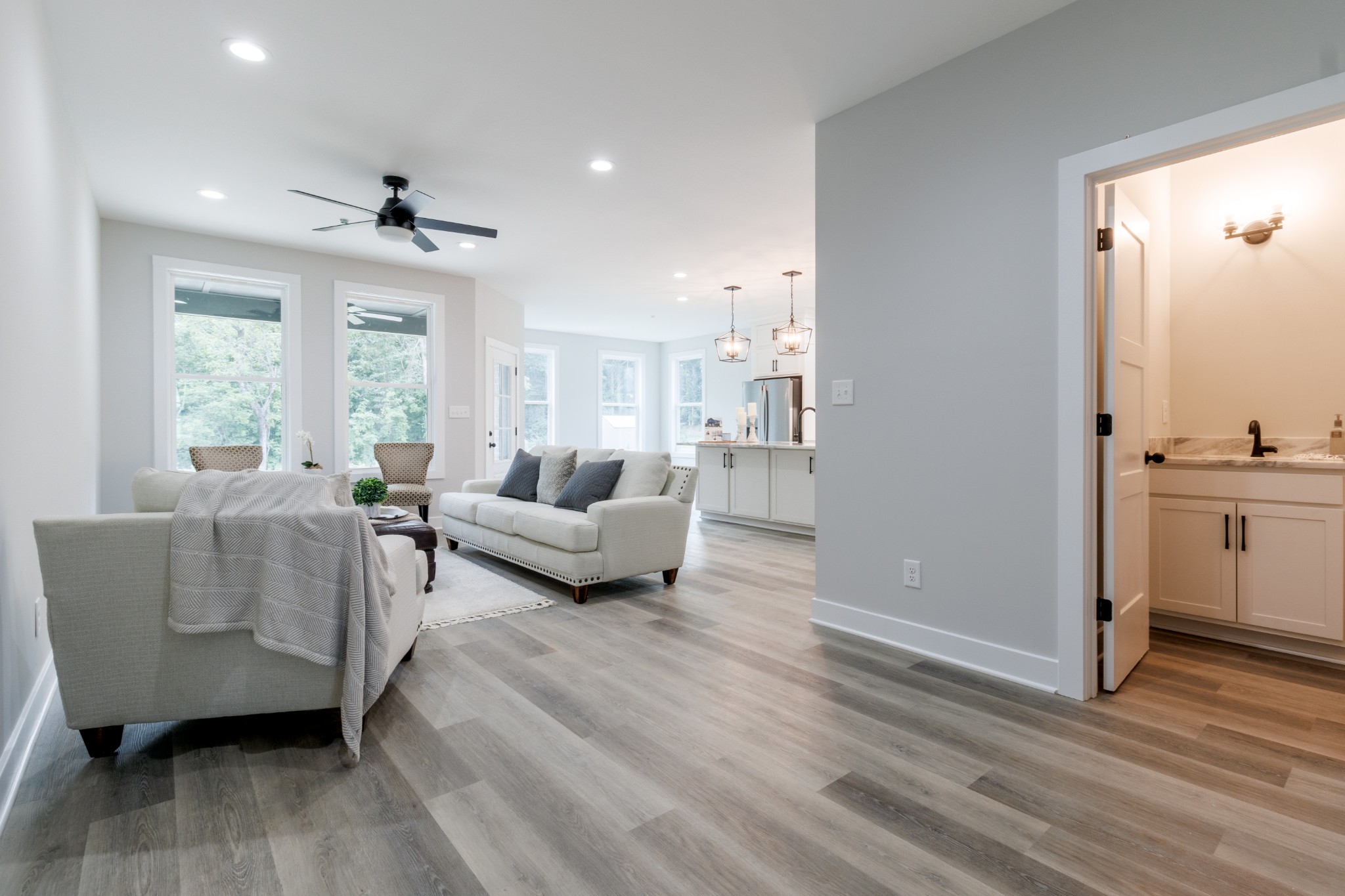 199 Gower Street Pleasant View, TN 37146 - Photo 12 of 38 a living room with furniture and a large window