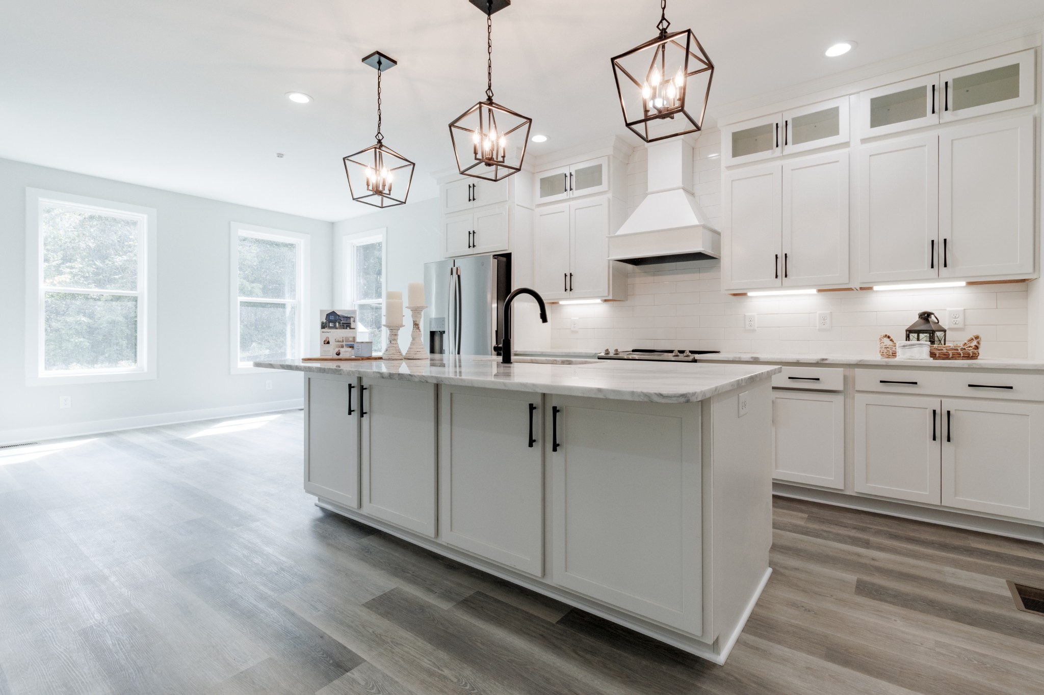 199 Gower Street Pleasant View, TN 37146 - Photo 15 of 38 a kitchen with cabinets window and stainless steel appliances