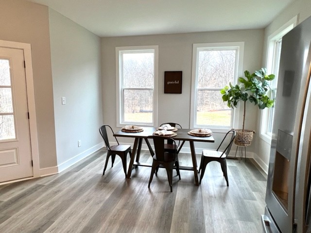 199 Gower Street Pleasant View, TN 37146 - Photo 17 of 38 a view of a dining room with furniture and window