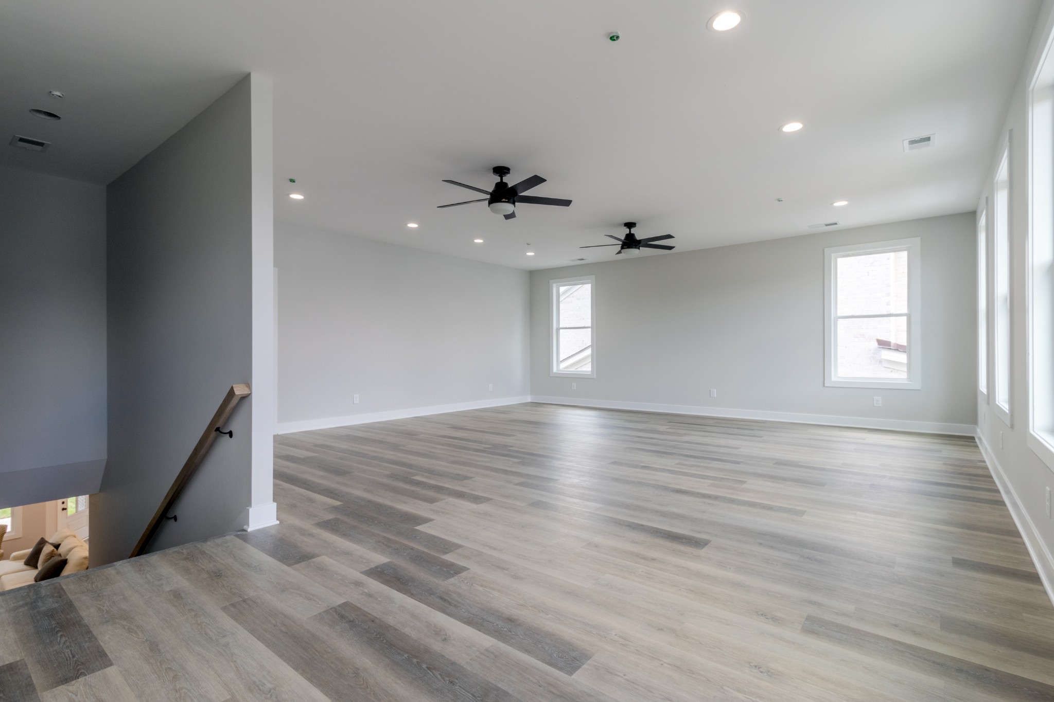 199 Gower Street Pleasant View, TN 37146 - Photo 29 of 38 an empty room with wooden floor and windows