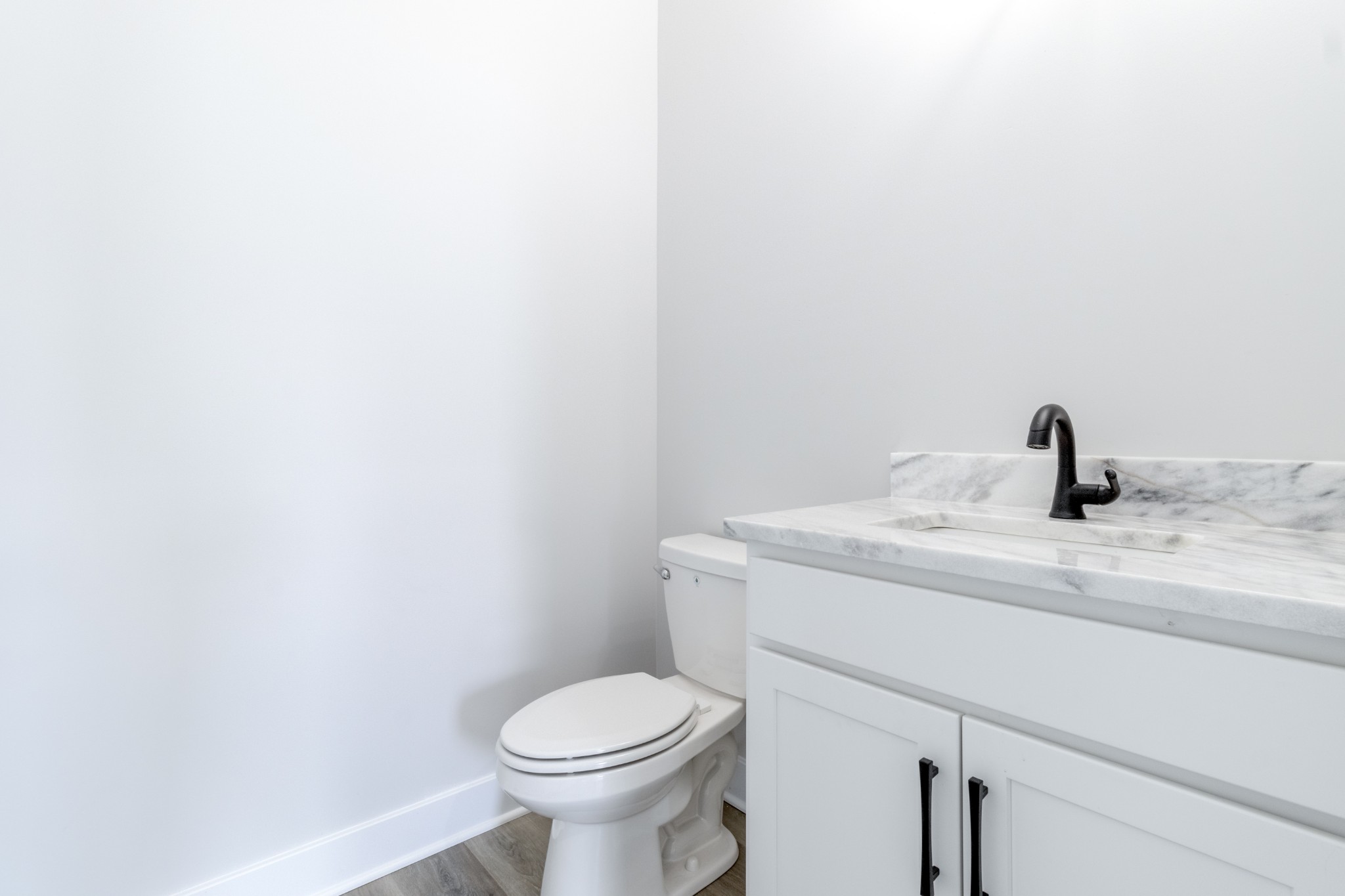 199 Gower Street Pleasant View, TN 37146 - Photo 32 of 38 a bathroom with a sink a toilet and a mirror