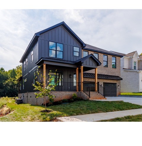 199 Gower Street Pleasant View, TN 37146 - Photo 4 of 38 a front view of a house with garden