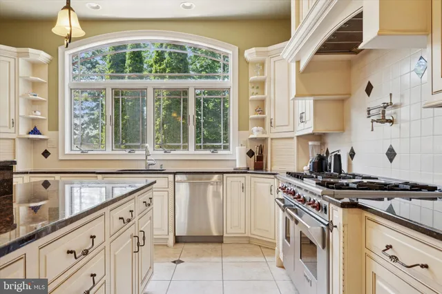 a bathroom with a sink mirror and toilet