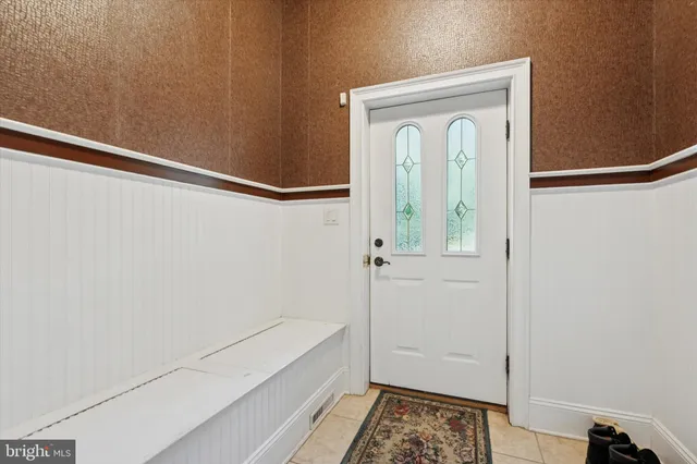 a living room with furniture pool table and a table