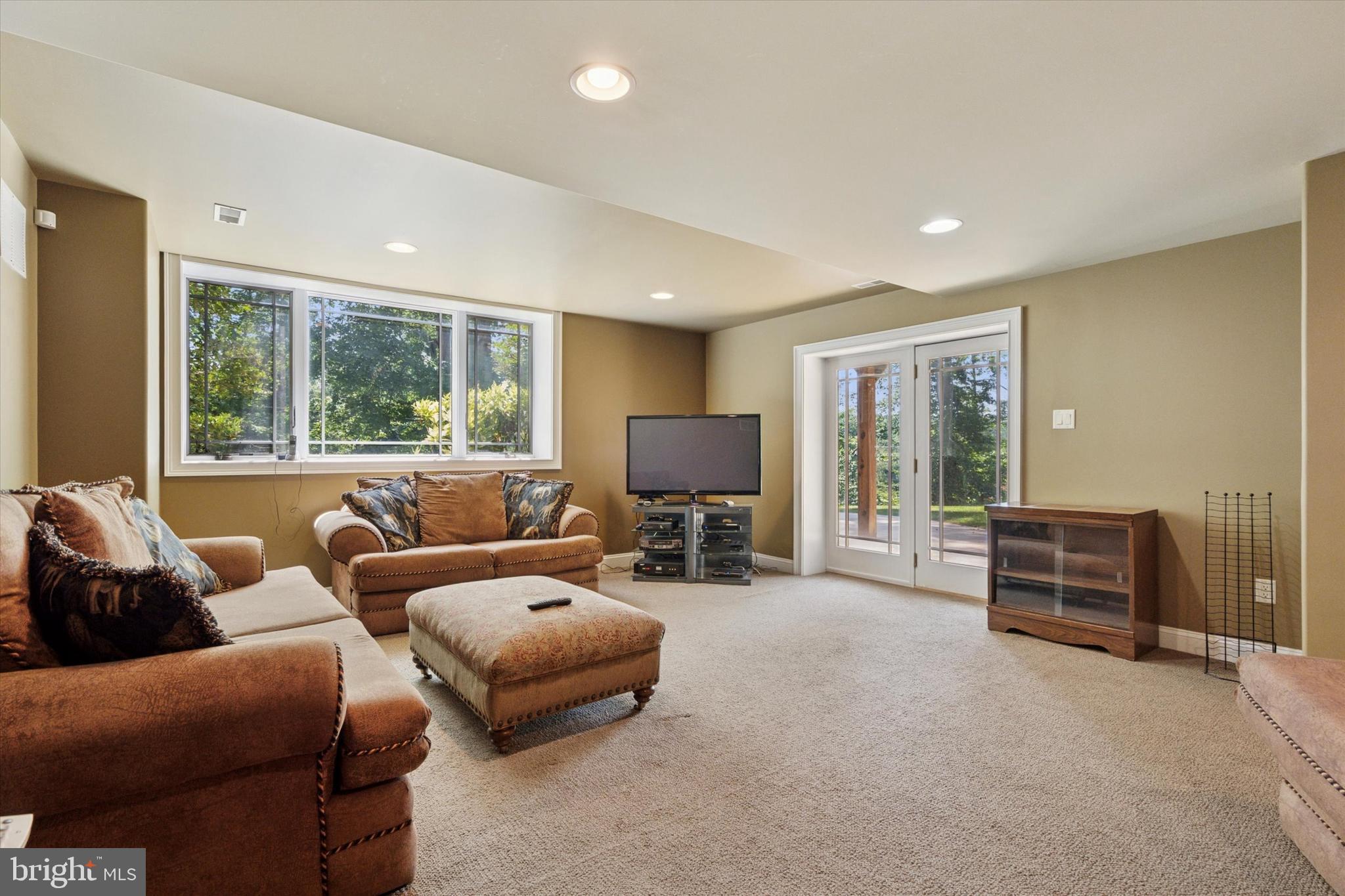 1514 Cherry Lane Rydal, PA 19046 - Photo 24 of 50 a living room with furniture and large windows