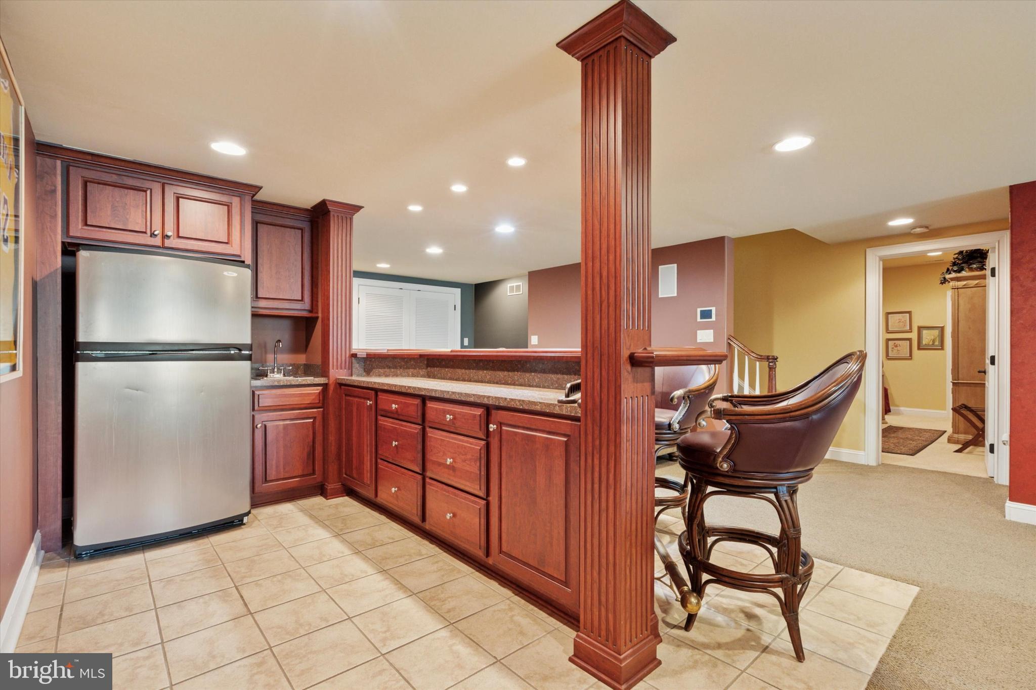 1514 Cherry Lane Rydal, PA 19046 - Photo 28 of 50 a kitchen with stainless steel appliances granite countertop a refrigerator a stove and a sink with granite countertops