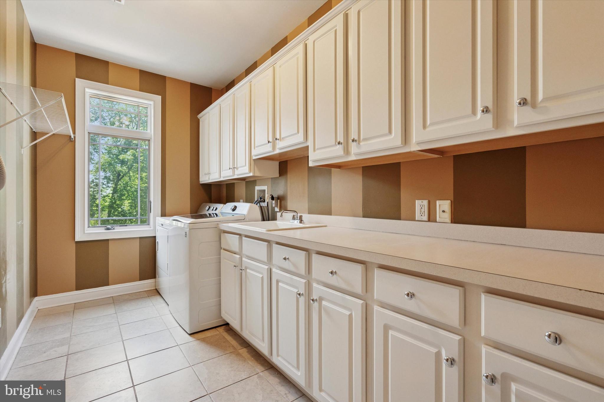 1514 Cherry Lane Rydal, PA 19046 - Photo 38 of 50 a kitchen with granite countertop white cabinets and white appliances