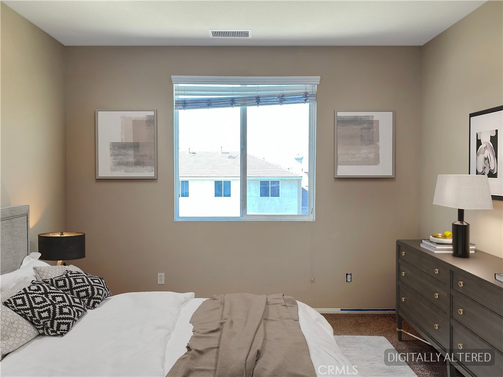 9549 Calico Trail Riverside, CA 92508 - Photo 21 of 46 a bedroom with a bed and a window