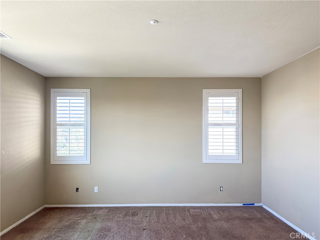 9549 Calico Trail Riverside, CA 92508 - Photo 24 of 46 an empty room with windows