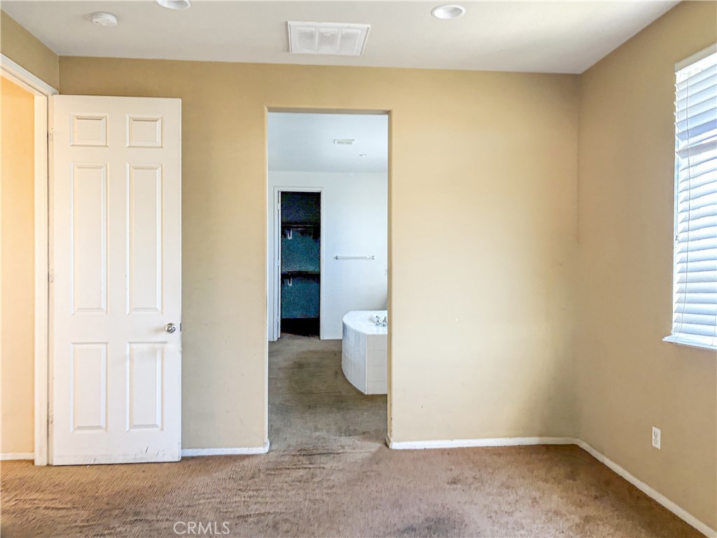 9549 Calico Trail Riverside, CA 92508 - Photo 25 of 46 a view of an empty room with a window