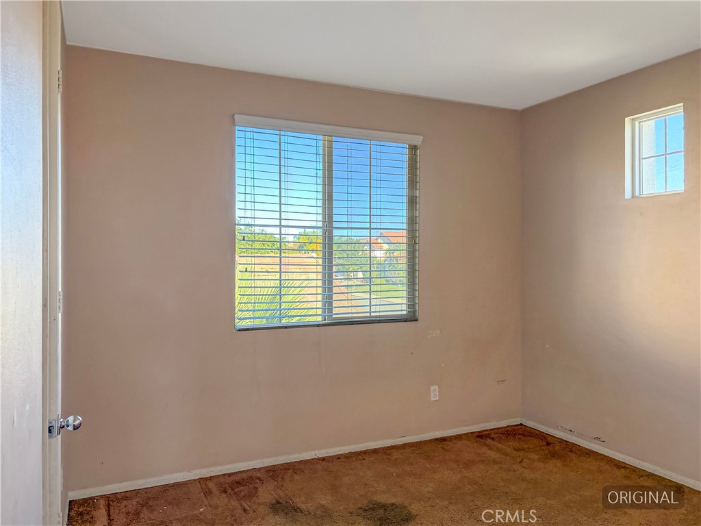 9549 Calico Trail Riverside, CA 92508 - Photo 32 of 46 a view of an empty room with a window