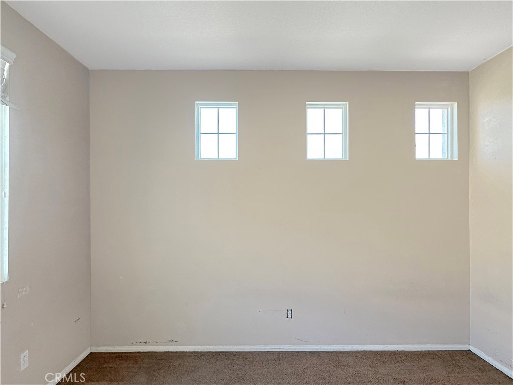 9549 Calico Trail Riverside, CA 92508 - Photo 33 of 46 an empty room with windows