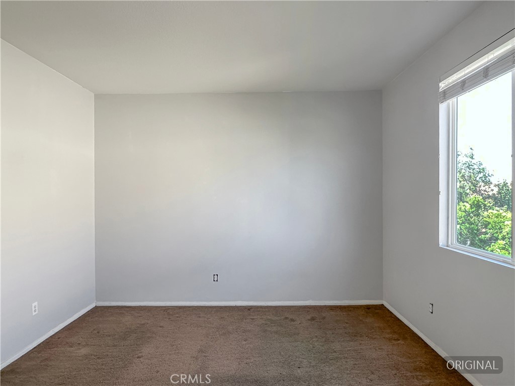 9549 Calico Trail Riverside, CA 92508 - Photo 37 of 46 an empty room with a window