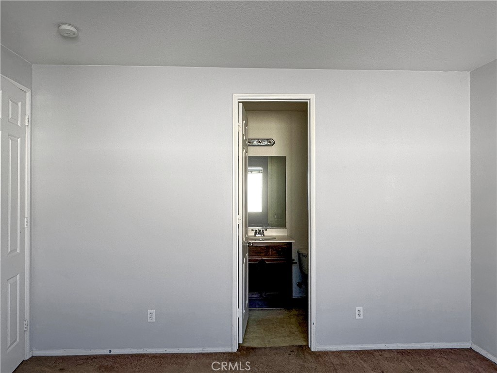 9549 Calico Trail Riverside, CA 92508 - Photo 38 of 46 a view of a bathroom from the hallway