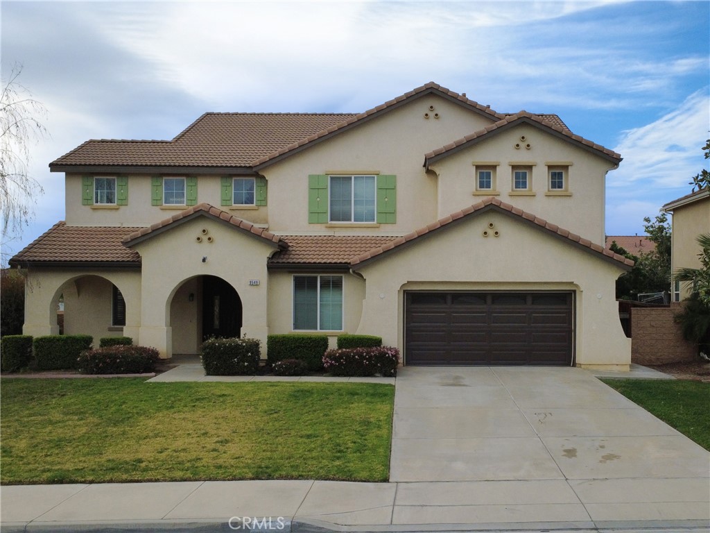 9549 Calico Trail Riverside, CA 92508 - Photo 45 of 46 a front view of a house with a yard