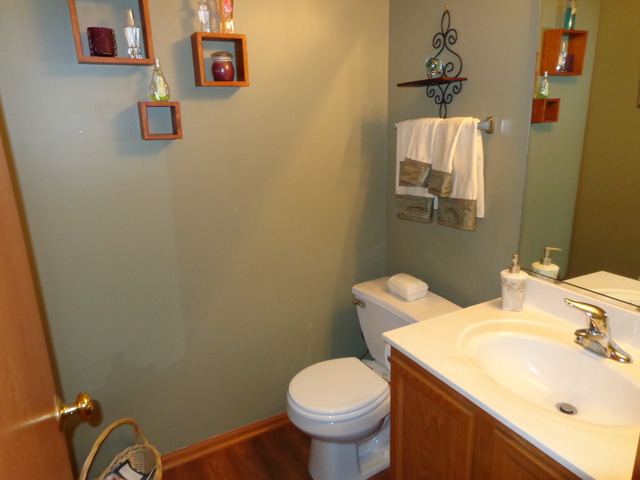 2217 Ashby Lane Plainfield, IL 60586 - Photo 18 of 20 a bathroom with a sink and a toilet