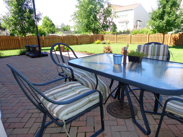 2217 Ashby Lane Plainfield, IL 60586 - Photo 19 of 20 a view of a outdoor seating area with furniture