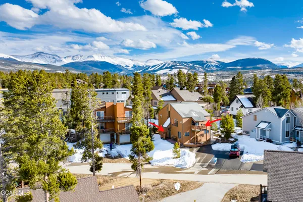 a picture of a bench in front of a gate