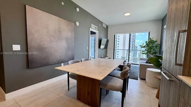 a kitchen with a stove a sink and a refrigerator