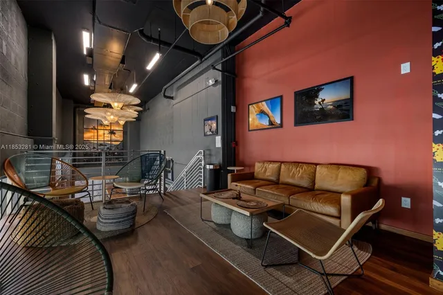 a view of a patio with a table and chairs