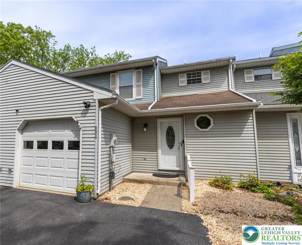 896 Briarstone Road Bethlehem, PA 18017 - Photo 1 of 26 a front view of a house with garage