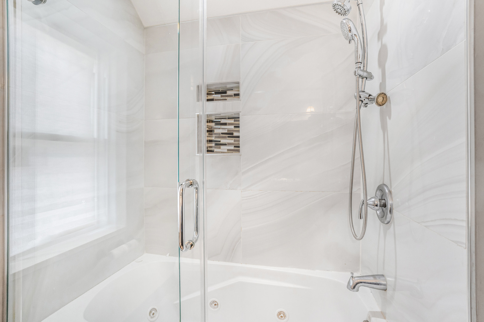4158 West 58th Place, Unit 4158 Chicago, IL 60629 - Photo 15 of 22 a bathroom with a shower