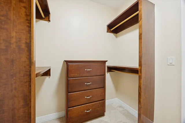a bathroom with a shower and bathtub