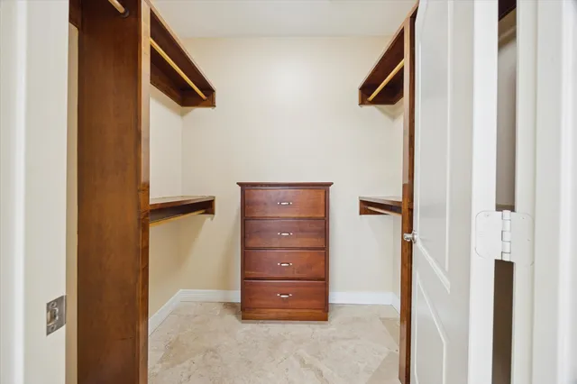 a view of an empty walk in closet