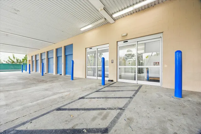 a view of a porch with a refrigerator